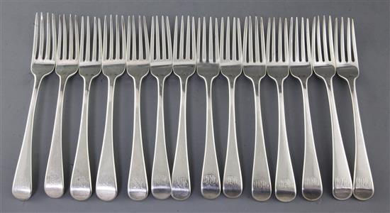 A set of fourteen George III silver Old English pattern table forks by Thomas Wallis II, 28 oz.
